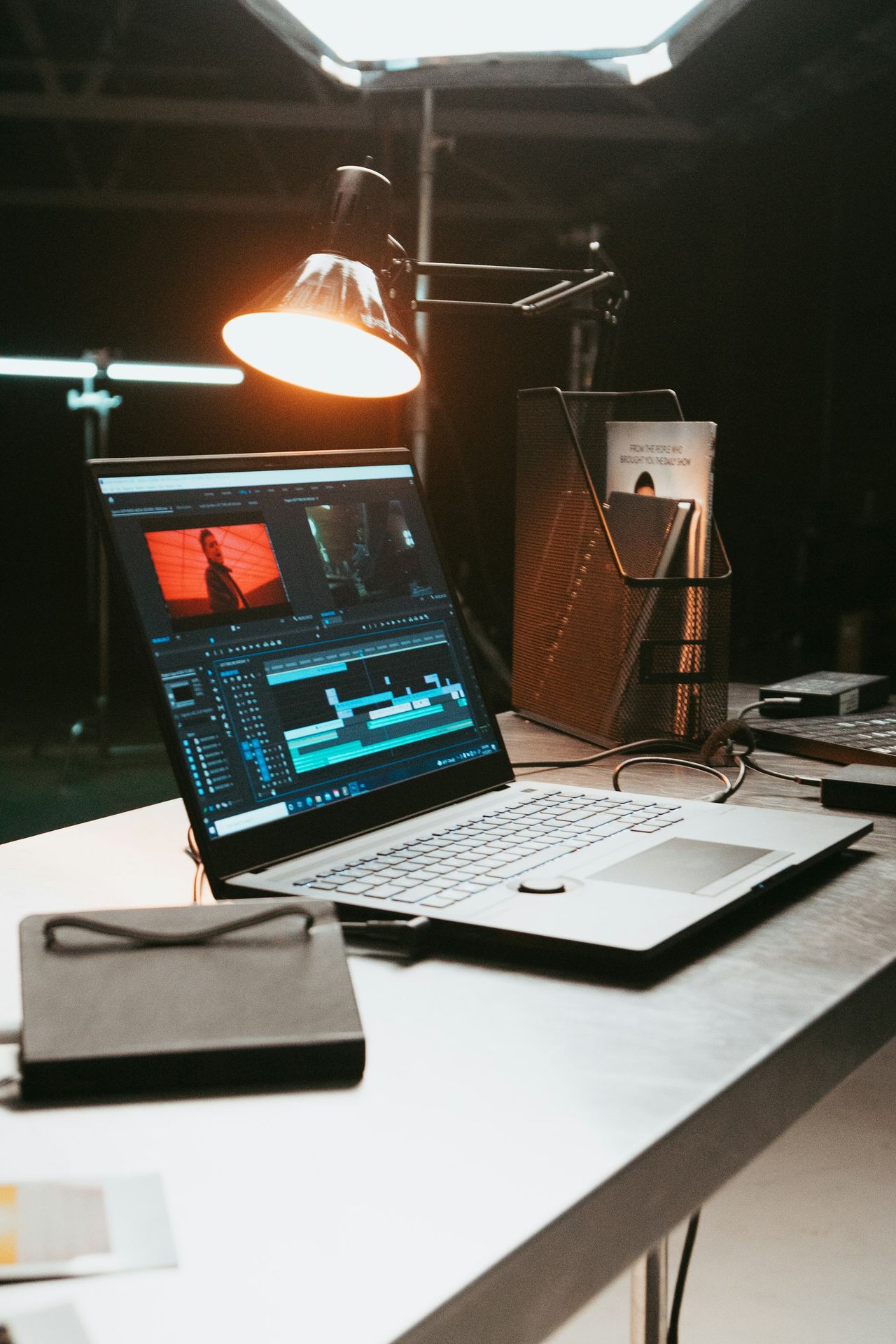 a laptop computer sitting on top of a desk